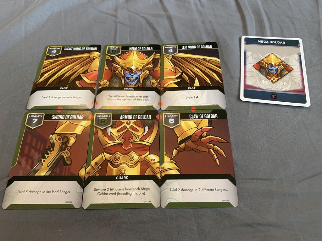 Power Rangers: Heroes of the Grid – Mega Goldar Deluxe Figure cards